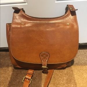 Patricia Nash leather saddle bag.